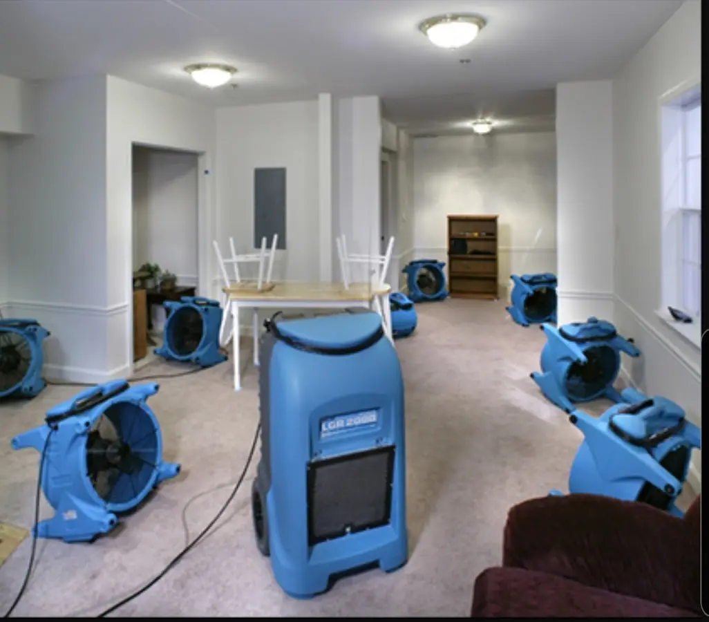 Air movers and dehumidifier setup for Water Damage Restoration in East Windsor